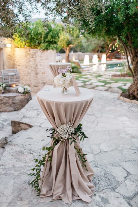 High tables can be decorated in a thousand ways, we love the rustic look with the long table cloth and flower decoration for this rustic Greek island wedding. Champagne Tables, Wedding Round Table Decorations, Wedding In The Garden, Wedding Cocktail Tables, Cocktail Table Decor, Cocktail Decor, Greek Island Wedding, High Tables, Cocktail Hour Decor