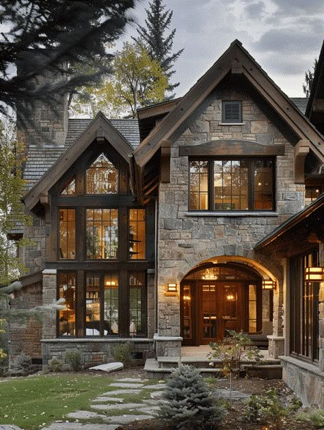 25 Rustic Home Exterior Ideas for Curb Appeal Cathedral Home Exterior, Home Ideas Outside House, Exterior House Design Stone, Old World Style Home Exterior, Tudor Lake House, Dark And Moody House Exterior, Windows Outside Design, Canada House Exterior, Fall Homes Exterior