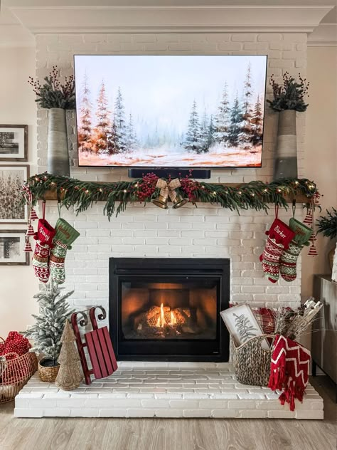 Bottom Of Fireplace Christmas Decor, Tv Above Fireplace Christmas Decor, Christmas Fireplace With Tv Decor, Tv Mantel Christmas Decor, How To Decorate Mantle With Tv Above It For Christmas, Fireplace Mantle Christmas Decor With Tv, Christmas Mantle Tv Above, Christmas Decor Ideas For Mantle With Tv, Fireplace With Tv Above Christmas Decor