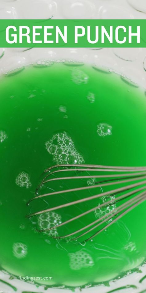 A large glass punch bowl is filled with a bright green punch. A wire whisk is stirring the mixture. Green Christmas Punch, Grinch Punch Recipe, Hawaiian Punch Recipes, Green Punch Recipes, Grinch Punch, Green Punch, Recipe For Christmas, Christmas Punch Recipes, Hawaiian Punch