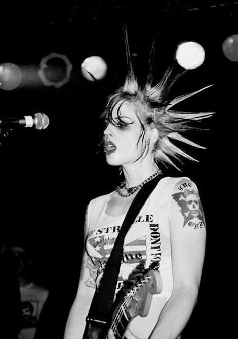 Brody Dalle (Lead vocalist & guitarist for the punk band The Distillers; Later lead vocalist for the alternative rock band Spinnerette. The Distillers' album "Coral Fang" was certified silver in the UK. With Spinnerette, winner of an Independent Music Award) The Distillers, Her Hair, Piercings, A Woman, Guitar, Black And White, Hair, White, Black