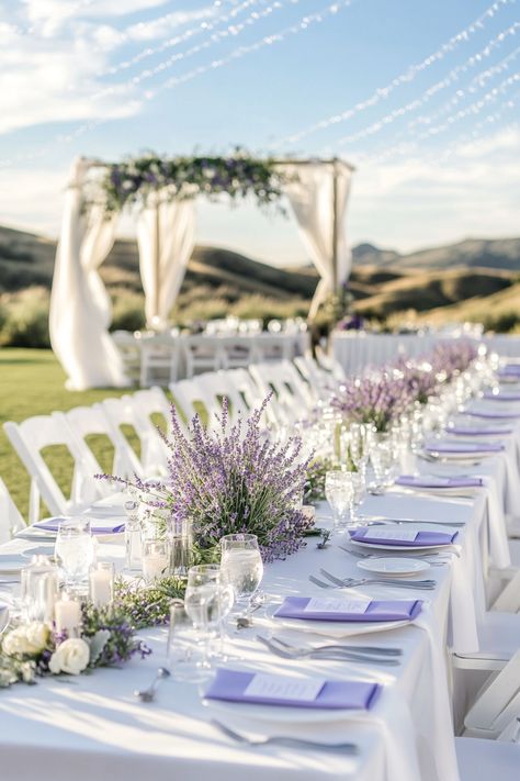 Elevate your big day with stunning lavender-themed wedding floral arrangements! These enchanting blooms add a touch of elegance and charm, creating an unforgettable atmosphere for you and your guests. Discover unique ideas and inspiration to make your wedding truly special!  #LavenderWedding #WeddingFloralArrangements #WeddingPlanning #BridalInspiration #WeddingDecor #WeddingFlowers #FloralDesign #UniqueBridalIdeas #RomanticWeddings #WeddingAesthetics #FloralInspiration #LavenderTheme #WeddingInspo #ElegantWeddings #BigDayBliss Wedding Venues Lavender, Light Lavender Wedding Theme, Lavendar Wedding Aesthetic, Lavender Backyard Wedding, Lilac And Blue Wedding Decor, Lilac Table Setting Wedding, Light Purple Wedding Decor, Lavendar Wedding Centrepiece, Lavender Wedding Florals