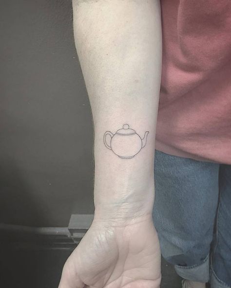 Small fine line style teapot tattoo on the right inner wrist. Tattoo Artist: East Teapot Tattoo, Tea Tattoo, Teacup Tattoo, Fineline Tattoo, Single Needle Tattoo, Henna Tattoo Hand, London Tattoo, Small Wrist Tattoos, Best Tattoo Designs