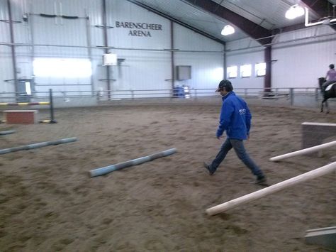 Dom walks out the distance for placement poles to help a rushing horse slow the canter. Photo by Rachael Walker. Canter Poles Distance, Pole Exercises, Winter Routine, Riding Ideas, Work Exercises, Dressage Training, Horse Exercises, Winter Training, Horse Riding Tips