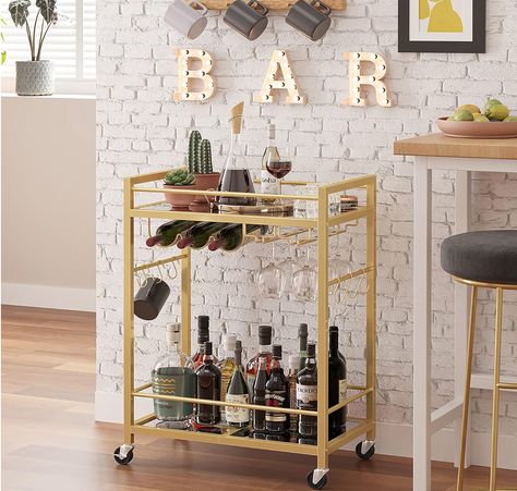 [Large Capacity] Size: 13"D X 23.7"W X 32.7"H , This bar cart with Wine Rack and Glass Holder on the first tier that can hold up to 6 wine glasses and 3 compartments for wine bottle storage. It can also be disassembled if you don't want to use it. 3 Shelves allowing it enough room to hold your drinks and snacks.
[Handle/6S Hooks/Protective Fence] This serving cart equipped with handle that can control direction easily. Offer 6 S-shaped hooks that are perfect for hanging small utensils. Bar Cart Decor Ideas, Aesthetic Bar Cart, Wine Rack Glass Holder, Bar Cart Essentials, Aesthetic Bar, Beverage Cart, Cart Bar, Microwave Cart, Bar Cart Ideas