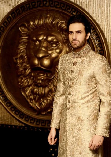 Model in golden sherwani. https://www.facebook.com/Shaadi.org.pk?fref=nf Golden Sherwani, Men Wedding Attire Guest, Golden Outfit, Groom Dress Men, Indian Groom Wear, Walima Dress, Lovely Wedding Dress, Mens Wedding Attire, Marriage Dress