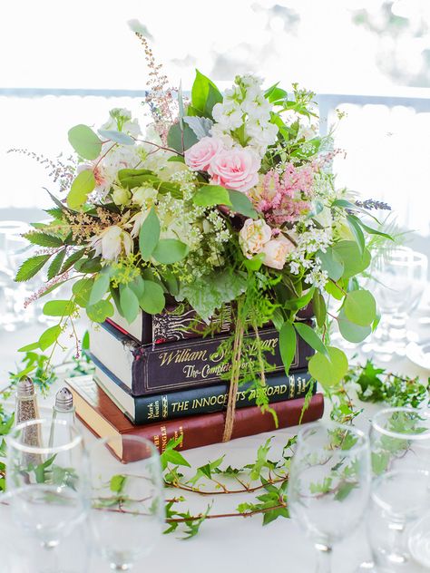 Embrace your inner bookworm with these fun ideas for escort cards, centerpieces, favors and ceremony accents. Book Themed Wedding Decorations, Book Wedding Centerpieces, Book Centerpieces, Book Themed Wedding, Unique Wedding Flowers, Wedding Floral Centerpieces, Flower Centerpieces Wedding, Deco Floral, Wedding Flower Arrangements