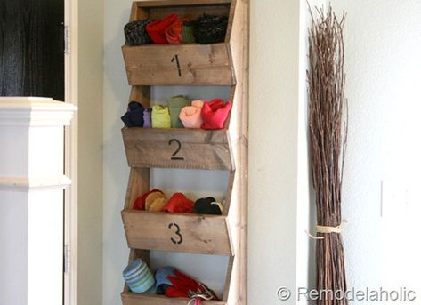 10 Sneaky Ways to Store Winter Gear - Bob Vila Storing Winter Hats And Gloves, Storage For Hats And Gloves Entryway, Gloves And Hat Storage Ideas, Kids Hat And Mitten Storage, How To Store Hats And Gloves, Winter Gear Storage Small Space, Winter Coat Organization, Hats And Gloves Storage Entryway, Glove Storage Ideas Entryway