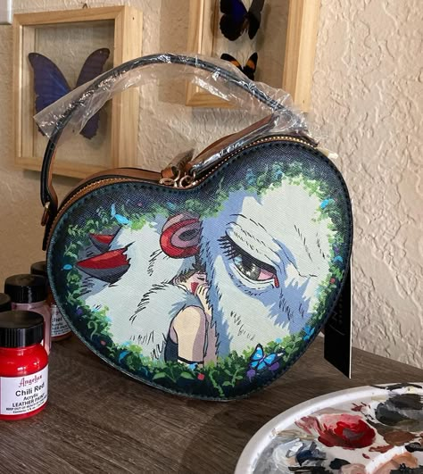 Crystal McQueen 🌞 on Instagram: “#PrincessMononoke hand painted bag 🌱🐺 Decided to do a raffle to help my parents who at this moment are going through a really difficult…” Hand Painted Bags, Denim Jacket Diy Paint, Studio Ghibli Crafts, James Fridman, Bag Painting, Diy Denim Jacket, Art Bags, Handpainted Bags, Diy Jacket