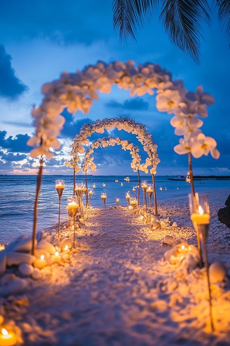 Wedding beach setup. Shell arch surrounded by tiki torches and floating white flowers.

Are you dreaming of a beachfront wedding ceremony enveloped in the sheer beauty of the sun, sand, and sea? Let us transport you to an ethereal world of oceanic allure as we delve into 25 spectacular Beach Wedding Ceremony Design Concepts that are sure to make your heart skip a…

Read more: https://tastywed.com/generated-post-25-romantic-beach-wedding-ceremony-design-concepts/ Beach Wedding Entrance Decorations, Dream Wedding Reception Beach, Beach Wedding Lounge Area, Fantasy Beach Wedding, Weddings On A Beach, Diy Beach Wedding Bouquet, Terracota Beach Wedding, White Beach Wedding Decor, June Beach Wedding Colors