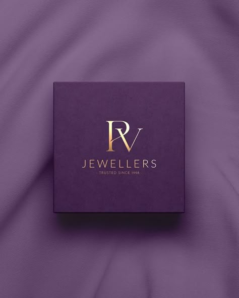 By modifying the Channe typeface, we crafted this elegant monogram logo for PV Jewellers. The font is an excellent choice for projects with a high-end & premium feel. Would highly recommend it. 'Jewellers' is written with the help of our good old friend, Lato - ideal for clean & minimal sub-titles.

For the final touch of luxury, we chose the combination of dark violet & gold to evoke a sense of class & sophistication. Logo Color Combinations, Jewelry Brand Logo, Free Monogram Fonts, Jewelry Logo Design, Free Monogram, Luxury Branding Design, Jewelry Logo, Brand Color Palette, Color Palette Design