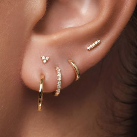 The Single Huggie (12mm) is the perfect basic for any ear stack. Made of 14 karat gold.  Per piece