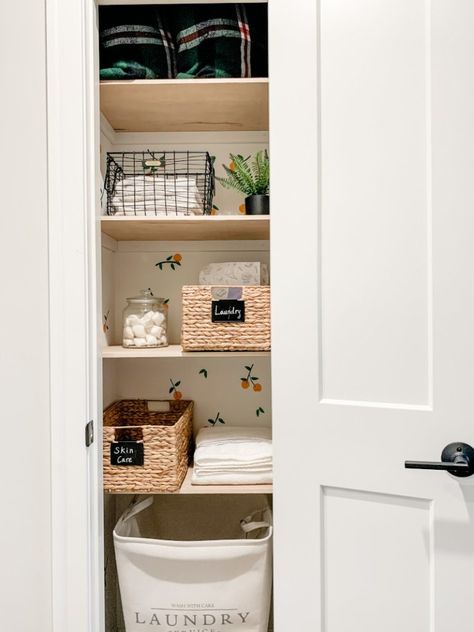 Easy Small Linen Closet Makeover on a Budget - Fun Home Building What To Put In Linen Closet, Sliding Door Linen Closet, Small Linen Closet Ideas In Bathroom, Bathroom Open Linen Closet Ideas, Small Linen Closet Door Ideas, Narrow Deep Closet Organization, Linen Closet Inspiration, Small Closet In Bathroom, Linen Closet No Door