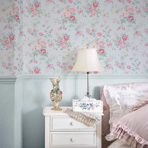 Wildflower wallpaper design features an enchanting garden floral scene inspired by an antique chintz fabric remnant from the Shabby Chic by Rachel Ashwell archive. A majestic display of traditional English wildflowers and roses creates an alluring and timeless print with an authentic vintage feel. The understated pale blue background highlights the blossoms' details and hues making it a captivating addition to any country cottage or classic interior. First introduced to the Shabby Chic collectio Floral Room Wallpaper, English Wildflowers, Modern Shabby Chic Bedroom, Wildflower Wallpaper, Sage Background, Off White Wallpapers, Shabby Chic Wallpaper, Blue Shabby Chic, Rachel Ashwell Shabby Chic