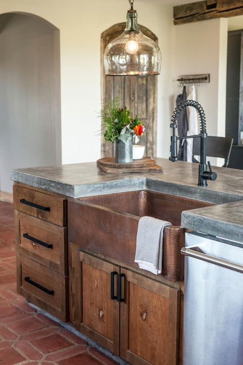 Sterling Zan is a fan of copper, so Joanna incorporated a copper farmhouse sink and brushed copper fixtures. Sink And Dishwasher, Dapur Rustic, Kitchen Faucet Design, Kitchen Traditional, Black Kitchen Faucets, Modern Ideas, Farmhouse Kitchen Cabinets, Concrete Kitchen, Kitchen Remodel Idea