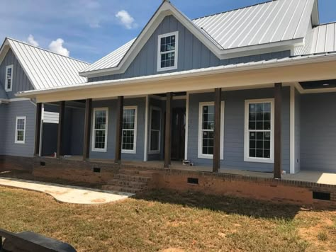 Silver metal roof; trim is SW Alabaster & siding is SW let it rain. All stain is Dark walnut Sherwin Williams Let It Rain, Metal Roof Houses Color Combos, Rooftop Hangout, Tin Roof House, Farmhouse Exterior Colors, Black Metal Roof, Metal Roof Houses, Metal Roof Colors, Lake Houses Exterior