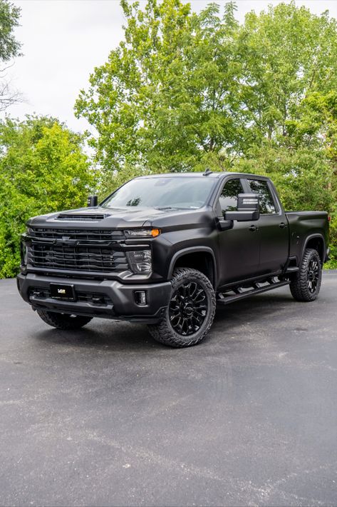 Custom 2024 Chevy Silverado with a satin black wrap and other accessory upgrades. Silverado Truck Interior, Custom Chevy Silverado, All Black Chevy Silverado, 2024 Chevy Silverado Ev, Blacked Out Truck, All Black Truck, Black Chevy Truck, Matte Black Truck, Black Pickup Truck