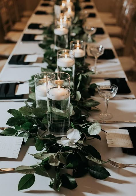 Dark Flowers Wedding Table Settings, Long Wedding Tables With Greenery, Long Greenery Centerpiece, Black Square Candle Holder Wedding, Rectangle Head Table Wedding Decorations, Dark Eucalyptus Wedding, Low Lush Wedding Centerpieces, Dark Greenery Wedding Centerpieces, Wedding With Rectangle Tables