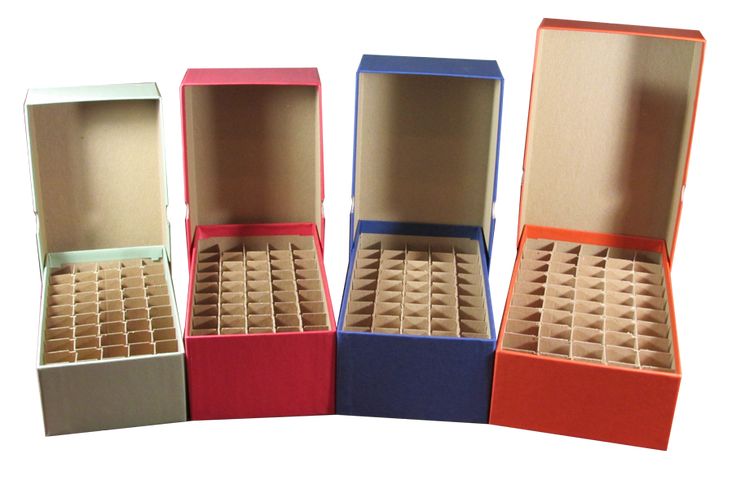 three open boxes with different compartments on each side