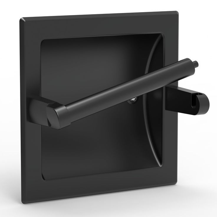 a black square object with a long handle on it's end and an opening to the side