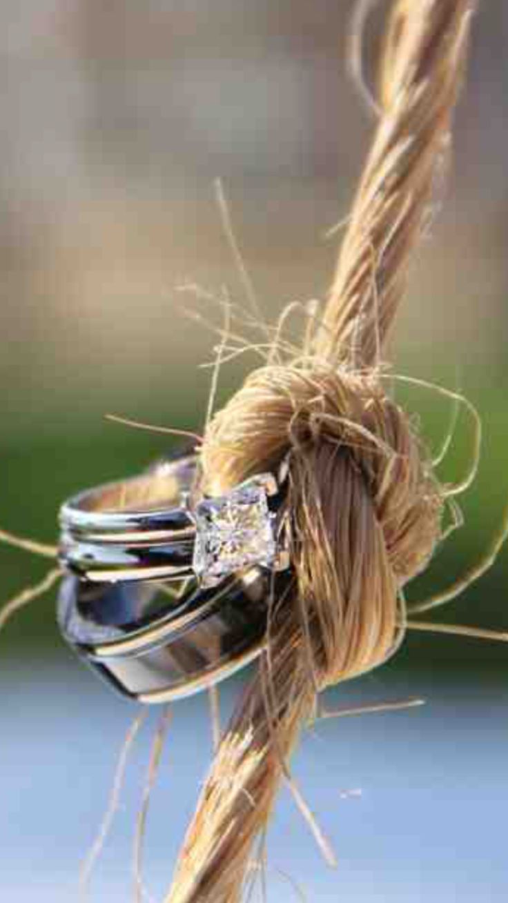 a close up of a ring on top of a rope