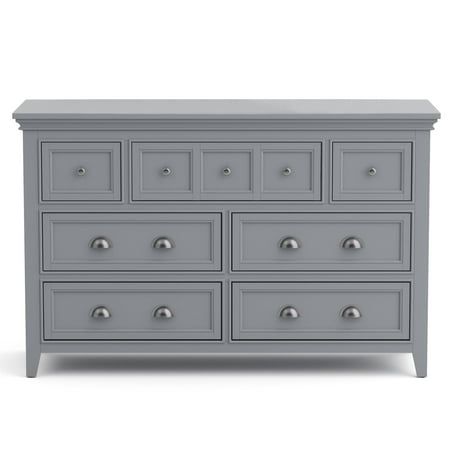 a gray dresser with many drawers and knobs on the top, in front of a white background