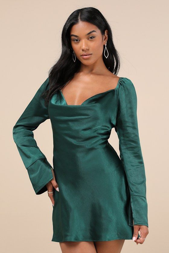 You'll be destined for fabulousness when you slip into the Lulus Sensational Fate Emerald Green Satin Cowl Neck Mini Dress for a night of drinks and dancing! Luxe stretch-woven satin shapes this effortlessly chic dress that features a flirty cowl neckline and long sleeves with elastic at the shoulders and unique flaring cuffs. The figure-skimming silhouette continues down to a subtle A-line skirt that ends at a cute mini hem. Hidden back zipper/clasp. Fit: This garment fits true to size. Length: Satin V-neck Mini Dress For Dinner, Stretch Bias Cut Dress For Night Out, Glamorous Long Sleeve Satin Dress For Party, Glamorous Long Sleeve Satin Evening Dress, Glamorous Long Sleeve Satin Party Dress, Flirty Satin Dress For Party Season Night Out, Satin Finish Fitted Bodice Mini Dress For Party, Glamorous Long Sleeve Satin Dress For Night Out, Satin Finish Mini Dress With Fitted Bodice For Party