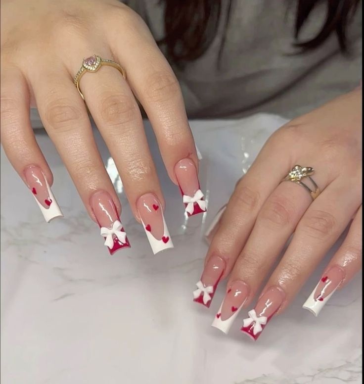 Flower Heart Nails, Red Nails With Bows, Bow Nail Ideas, Red Nails With Hearts, Acrylic Nails With Bows, Cute Bow Nails, Valentines Acrylics, Bows On Nails, Red Bow Nails