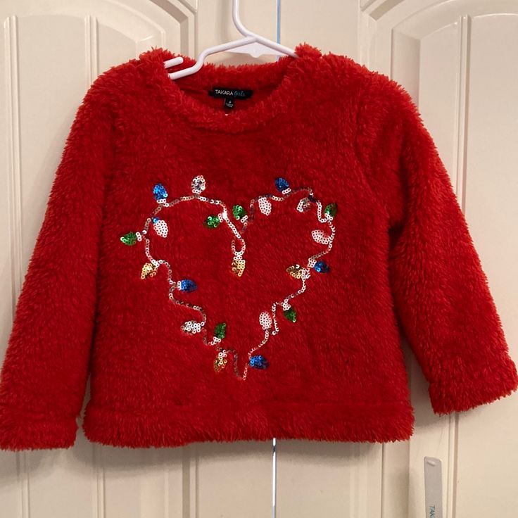 Takara Girls (From Dillard’s) Fuzzy Red Sweatshirt. Heart With Sequined Christmas Lights. Sooo Cute And Cozy But My Little Girl Said No. New With Tags. It’s Been In The Closet, But No Issues. Red Sweatshirt, In The Closet, The Closet, Christmas Sweatshirts, Christmas Lights, Kids Shirts, Shirts Tops, Size 4, Sweatshirts Hoodie