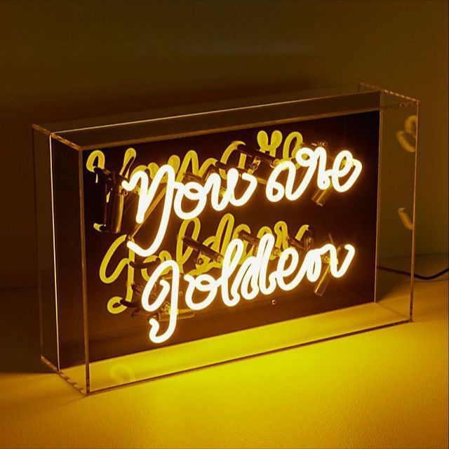 a neon sign that says you are golden