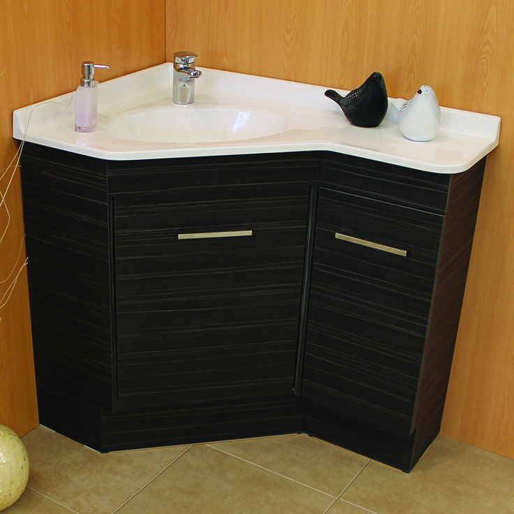 a bathroom with a sink and wooden walls