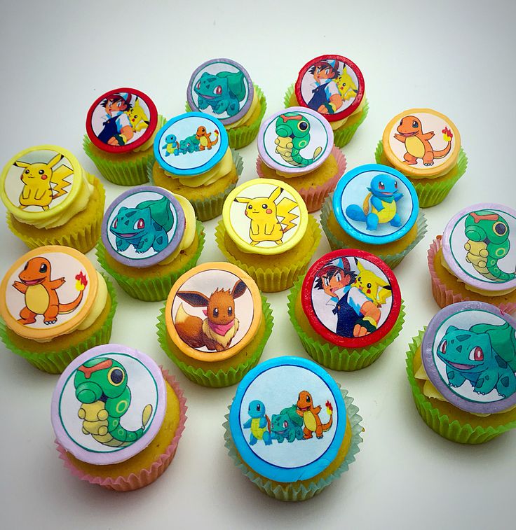 cupcakes decorated with pokemon images on them