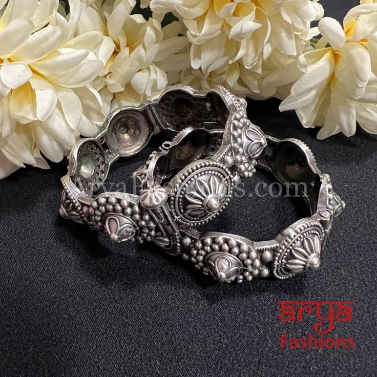 Rajasthani Gokhru Silver Oxidized Openable Bangles- Available Size: 2.6. Can fit size 2.8 due to openable feature.- Silver Oxidized Bracelet bangles in silver finish.- Very Elegant and stylish, these bangles can be paired with any Attire depending upon the occasion and the theme. - The base is pure brass (90%) and pure 92.5 silver (10%) which makes this very sturdy and of good quality. - 100% guarantee on the finish- it will not lose its finish/color/shine. - Very lightweight and Handcarved.- Op Luxury Traditional Oxidized Bangle, Silver Oxidized Finish Bangle For Weddings, Silver Temple Jewelry Bracelets For Ceremonial Occasions, Ceremonial Silver Temple Jewelry Bracelet, Silver Oxidized Wedding Bangle, Silver Wedding Bangle With Oxidized Finish, Heavy Silver Temple Jewelry Bangle, Silver Temple Jewelry Bangle For Rituals, Silver Bangle Temple Jewelry Bracelet