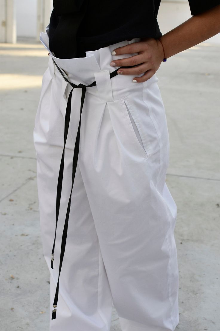 "Pants For Women, White Pants, Japanese Clothing This one is a very trendy high-wasted pants. It is shaped precisely for extravagant appearance. The belt is not part of the pants. It has been used to style them. If you wish to add the belt, please select the option pants + belt. You can style it with the top - https://etsy.me/2TeHIf3 ◈ Stylish and chic fashion is our shared dream! You can be sure that this piece is made with a lot of love and craftsmanship. ◈ S I Z I N G ◈ This item is available High-waisted Parachute Pants With Belt Loops For Summer, High Waist Parachute Pants With Belt Loops For Summer, Summer High-waisted Parachute Pants With Belt Loops, Summer Parachute Pants With Belt Loops, White High-waisted Harem Pants With Elastic Waistband, White Baggy High Waist Harem Pants, White High Waist Baggy Harem Pants, High Waist White Harem Pants With Pockets, White High-waisted Parachute Pants With Elastic Waistband