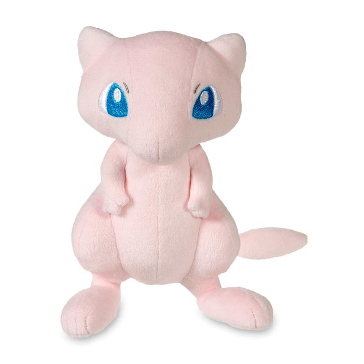 a pink stuffed animal with blue eyes on it's face and legs, sitting down