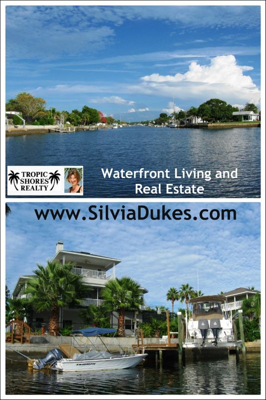 the waterfront living and real estate is featured in this postcard from silver lakes, florida