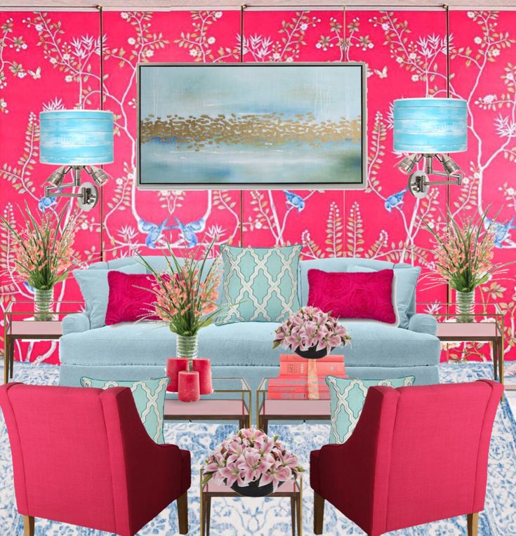 a living room with pink walls and blue couches in front of a painting on the wall