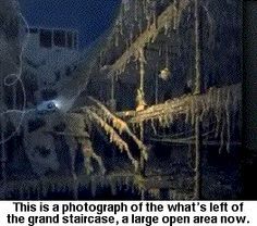 an image of a boat in the water with ice hanging off it's sides