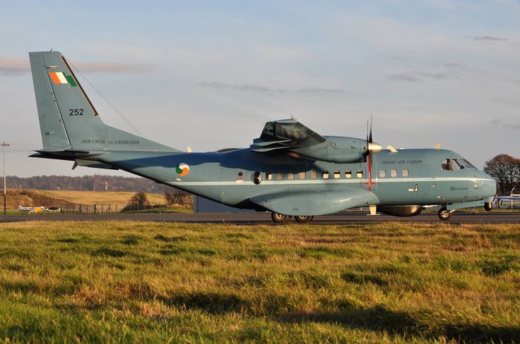 an airplane that is sitting in the grass