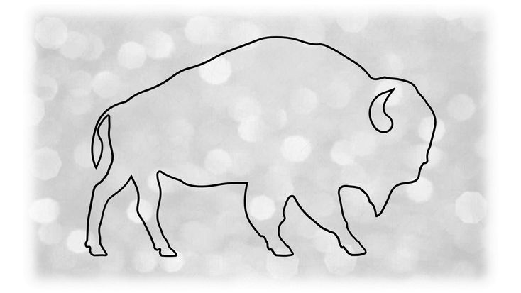 an outline drawing of a buffalo standing in front of a boket background with white lights