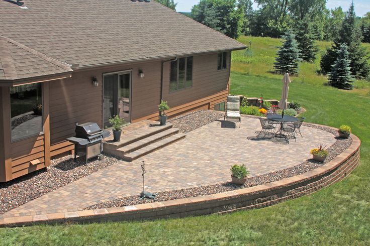 an aerial view of a home with patio and hot tub