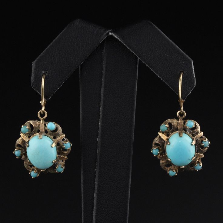 Gorgeous pair of turquoise drop earrings Item #JP-E0004 Metal: 14K Yellow Gold Weight: 7.2 Grams Gemstone Weight: Approximately 8 cts Measurements: 1 in x 0.75 in Layaway: For your convenience, we will be happy to provide layaway payment options. Please contact us to work out a layaway plan which best suits your needs. All layaway purchases are final sale. All domestic and international shipments are shipped with FedEx insured with signature required. International Shipments: Please note that cu Turquoise Pierced Earrings For Formal Occasions, Turquoise Drop Earrings For Formal Occasions, Turquoise Pierced Earrings For Formal Events, Fine Jewelry Turquoise Earrings, Formal Turquoise Jewelry With Matching Earrings, Victorian Turquoise Jewelry For Formal Occasions, Formal Turquoise Pierced Earrings, Turquoise Cabochon Earrings For Formal Occasions, Elegant Turquoise Earrings With Lever Back