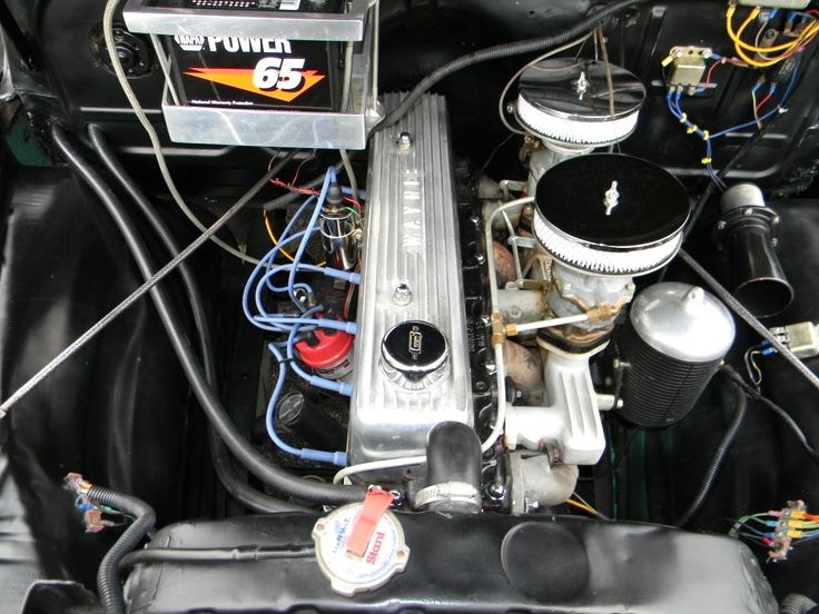 the engine compartment of an older model car