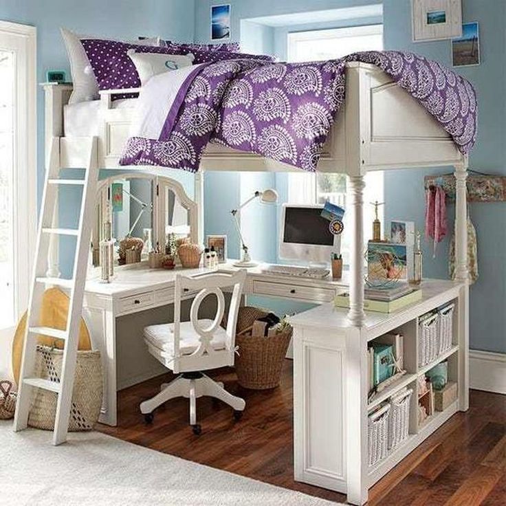 a white bunk bed sitting next to a desk with a computer on top of it