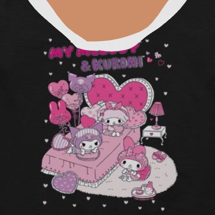 a woman wearing a black tank top with an image of hello kitty and her friends on it