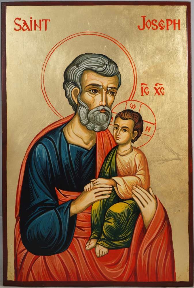 an icon of saint joseph holding a child