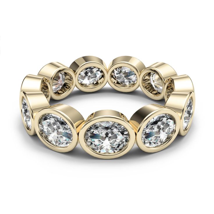 a yellow gold ring with white diamonds on the sides and two rows of round cut stones