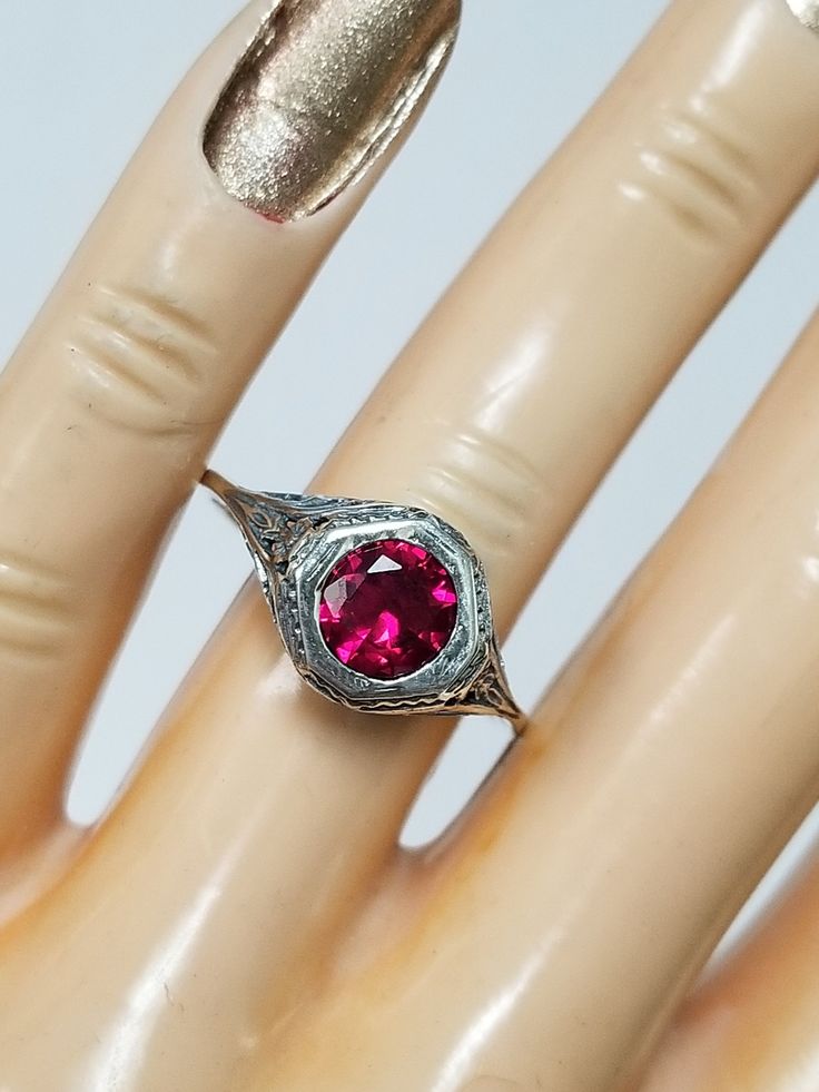 "Thanks for shopping our vintage estate store. We tend to sell well below wholesale and truly hope you enjoy all of our items. Many of the items are one of a kind, so please enjoy scrolling through the pictures and hopefully something will catch your eye. Brown spots are from the camera or reflections. Estate sterling silver 925 created 1ct ruby filigree ring. This is a custom made item from our shop, meaning we set the gem into the vintage setting. Gem is testing natural, but more than likely c Vintage Diamond Cut Jewelry For Anniversary, Vintage Sterling Silver Filigree Ring, Vintage Filigree Ring With Gemstone As A Gift, Vintage Sterling Silver Diamond Ring, Vintage Filigree Ring For Anniversary, Art Deco Silver Ruby Ring For Anniversary, Vintage Style Round Cut Diamond Ring, Silver Ruby Ring, Art Deco Style For Anniversary, Vintage Ring For Anniversary