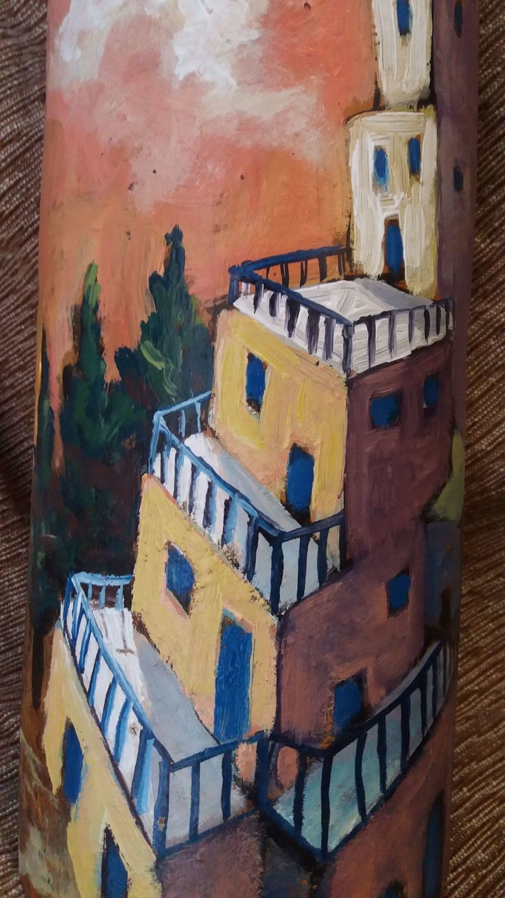 a painting of some buildings on a wall