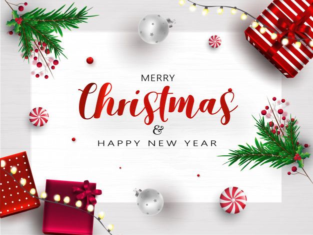 merry christmas and happy new year greeting card with presents on white wooden background, top view